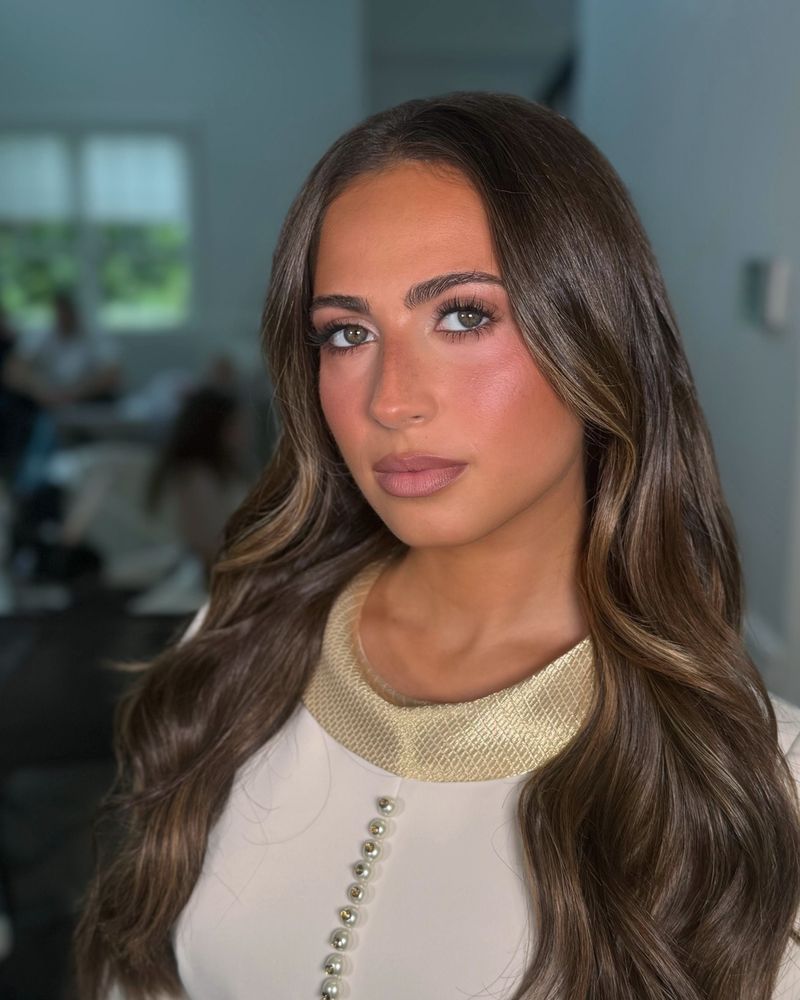 Bronzed glam with a gold-collared dress